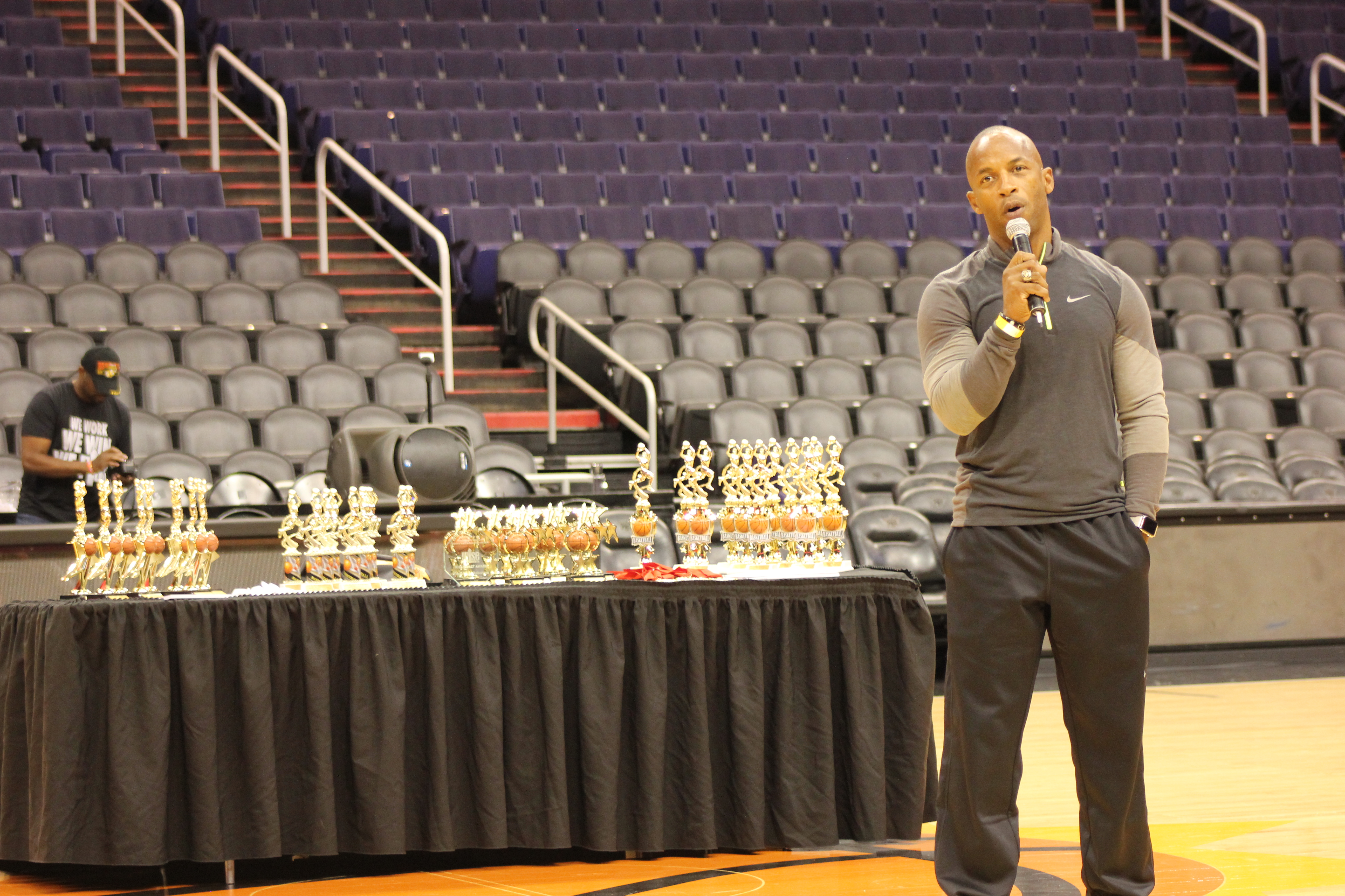 JJ Birden speaking at Rise Athletics event
